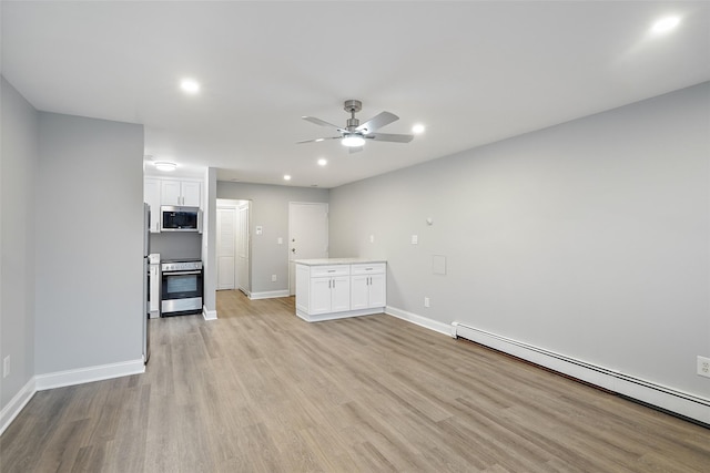 unfurnished living room with baseboards, a baseboard radiator, a ceiling fan, light wood-style floors, and recessed lighting