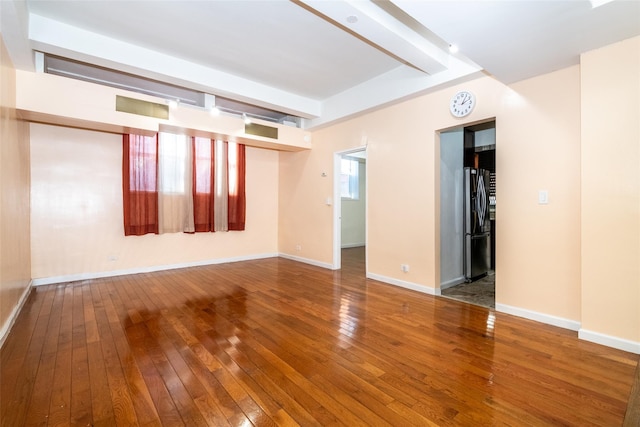 empty room featuring hardwood / wood-style floors