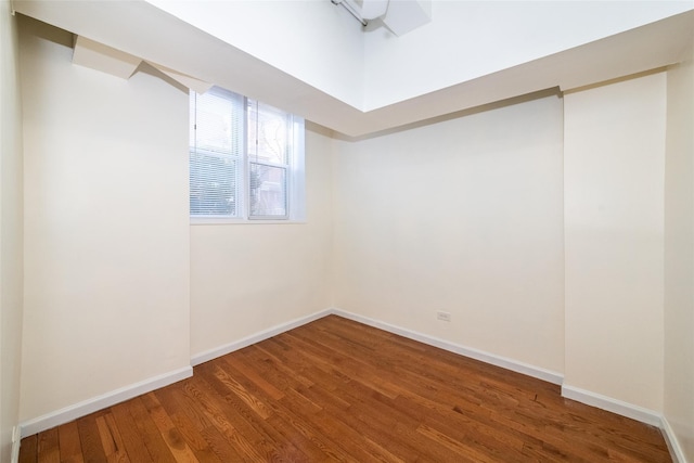 empty room featuring hardwood / wood-style floors