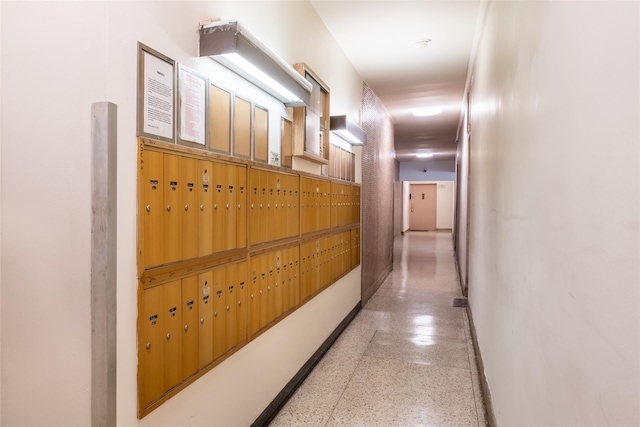 corridor featuring mail boxes