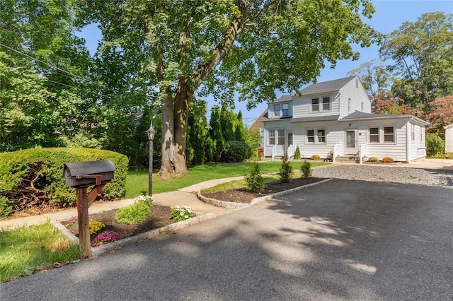 view of front of home with a front yard