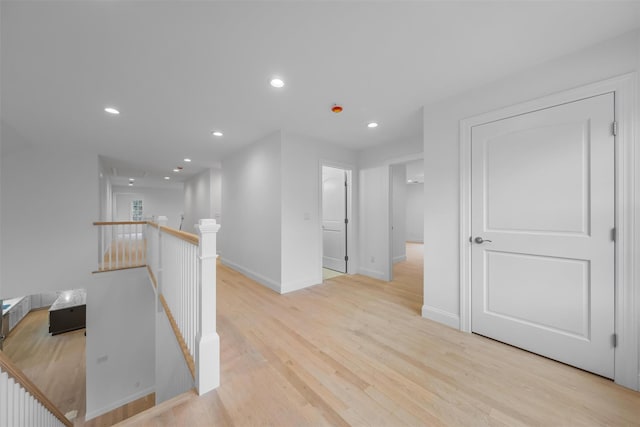 hallway featuring light hardwood / wood-style flooring