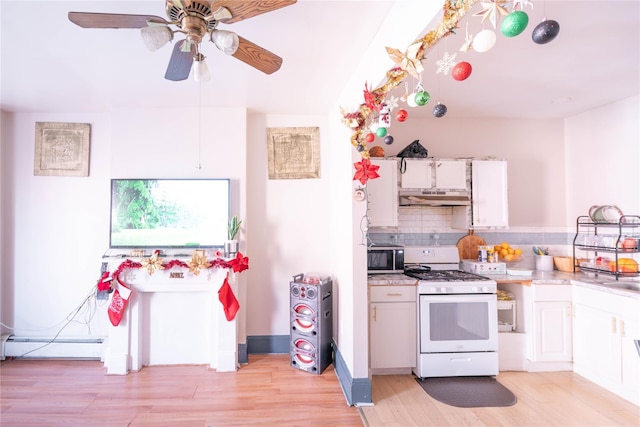 kitchen with tasteful backsplash, white range, a baseboard radiator, light hardwood / wood-style flooring, and white cabinetry