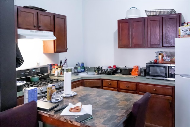 kitchen featuring sink and appliances with stainless steel finishes