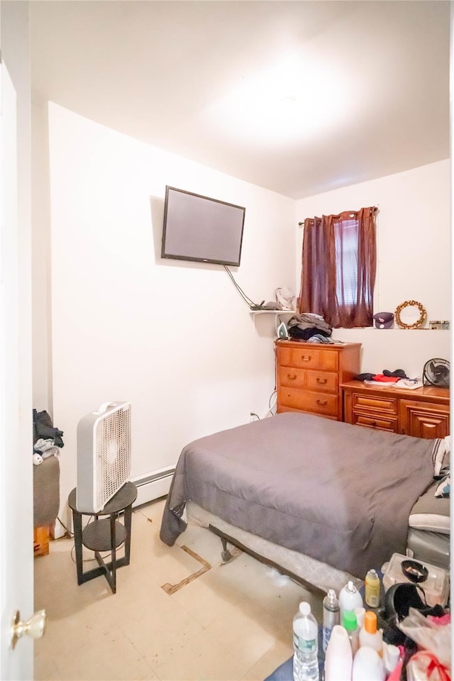 bedroom with a baseboard radiator