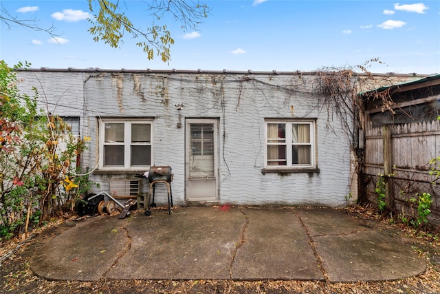 back of property featuring a patio