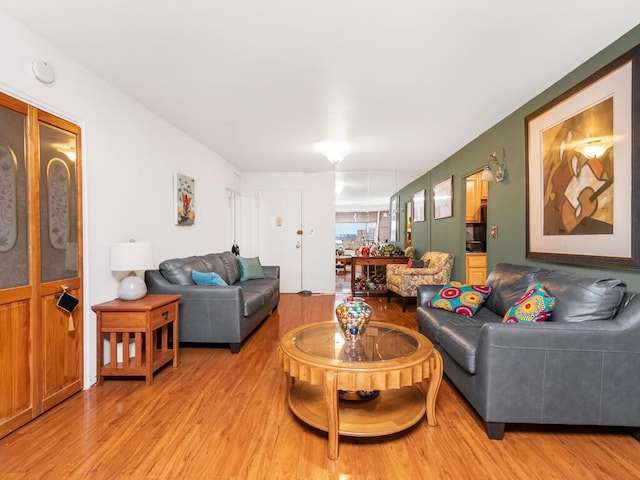 living room with light hardwood / wood-style floors