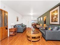 living room with wood-type flooring