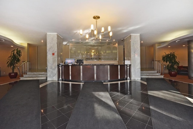 reception area with a chandelier