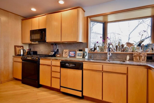 181 Starlight Rd, Monticello, NY 12701 - kitchen with tasteful backsplash, a sink, black appliances, light wood finished floors, and recessed lighting