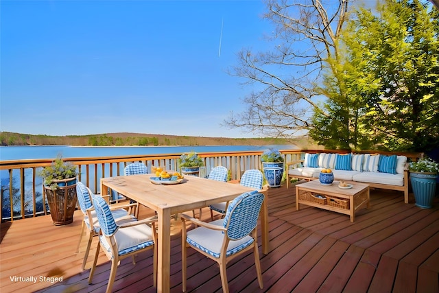 181 Starlight Rd, Monticello, NY 12701 - wooden deck featuring outdoor dining area, an outdoor living space, and a water view