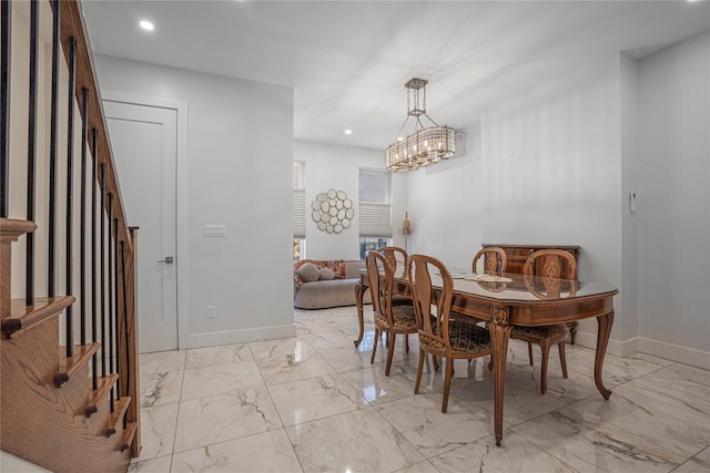 dining area with a notable chandelier