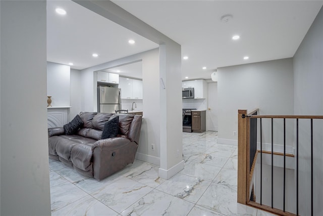 living room featuring sink