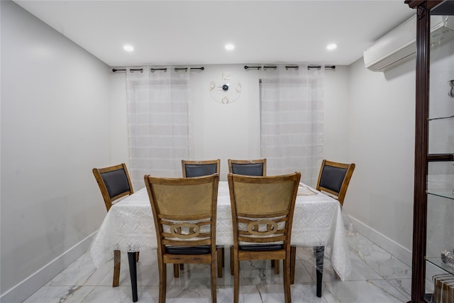 dining room featuring a wall mounted air conditioner