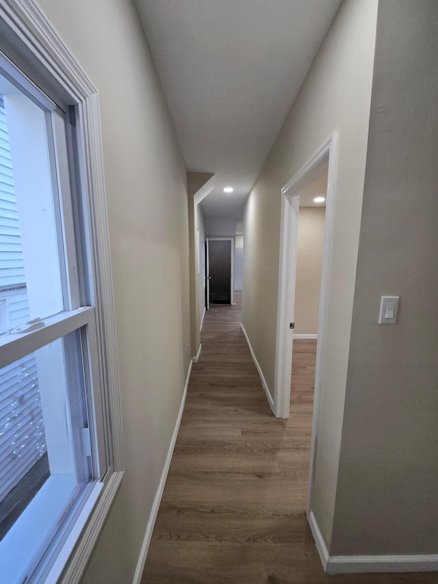 hallway featuring hardwood / wood-style floors