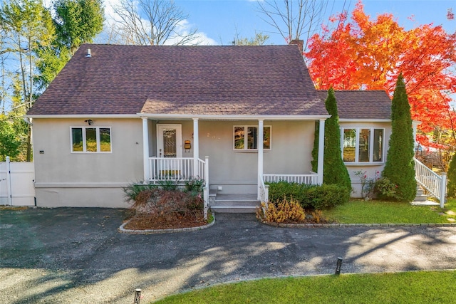 view of front of home featuring covered porch