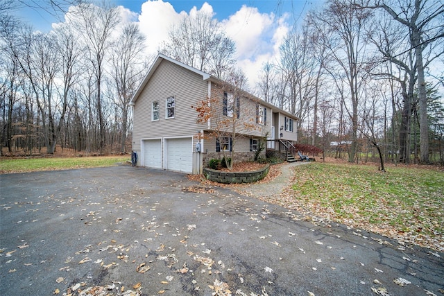 view of home's exterior featuring a garage