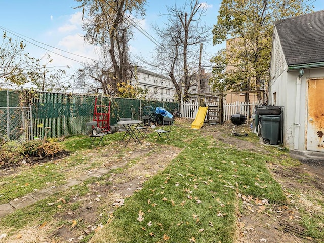 view of yard featuring a playground