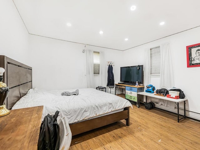 bedroom featuring hardwood / wood-style flooring