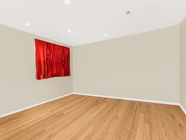 unfurnished room featuring light wood-type flooring