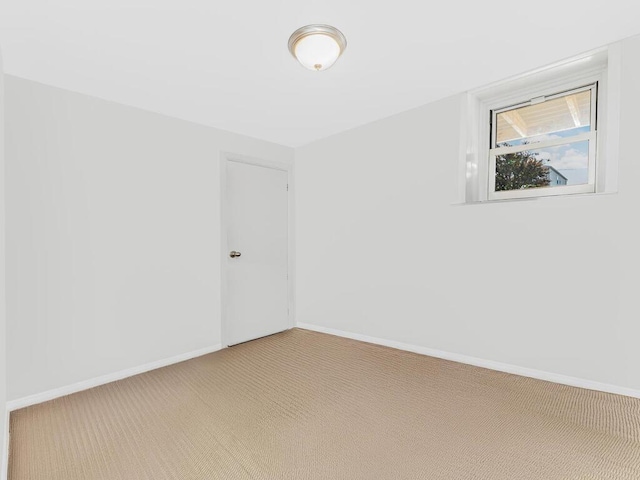 unfurnished room with carpet