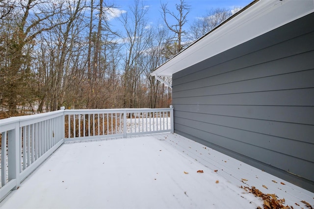 view of snow covered deck