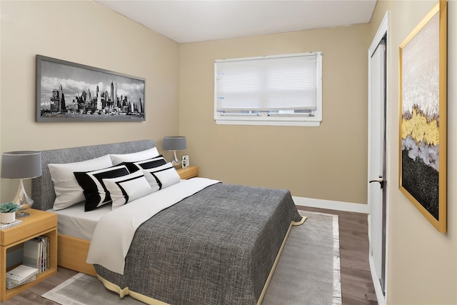 bedroom featuring a closet and hardwood / wood-style floors