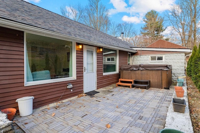 view of patio featuring a hot tub