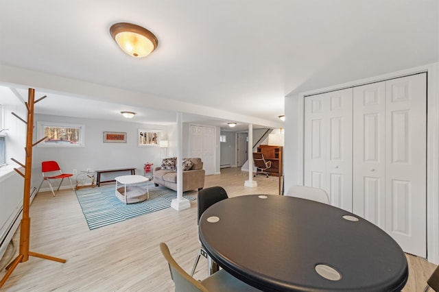 dining area with light hardwood / wood-style flooring