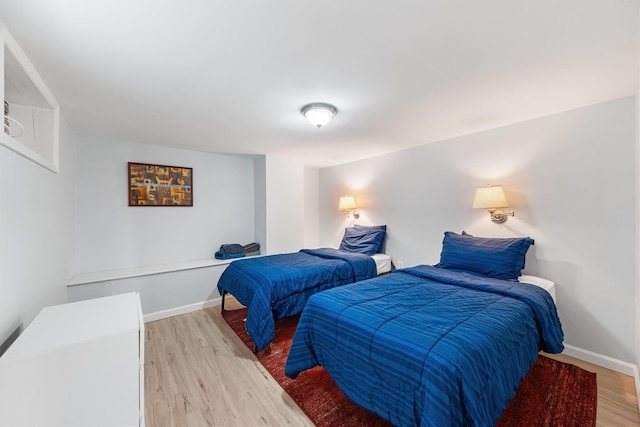 bedroom featuring light hardwood / wood-style flooring