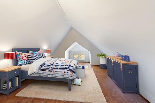 bedroom with dark wood-type flooring and lofted ceiling