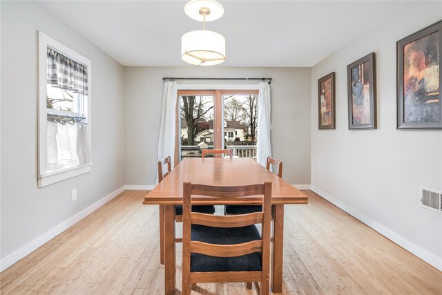 dining space featuring light hardwood / wood-style flooring