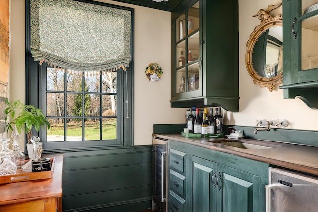 bar with sink, dishwashing machine, and beverage cooler