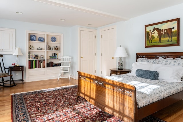 bedroom featuring light wood-type flooring