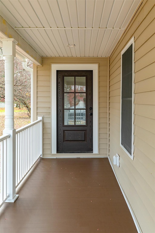 doorway to property featuring a porch