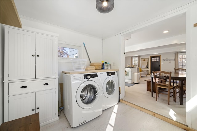 washroom featuring washing machine and dryer