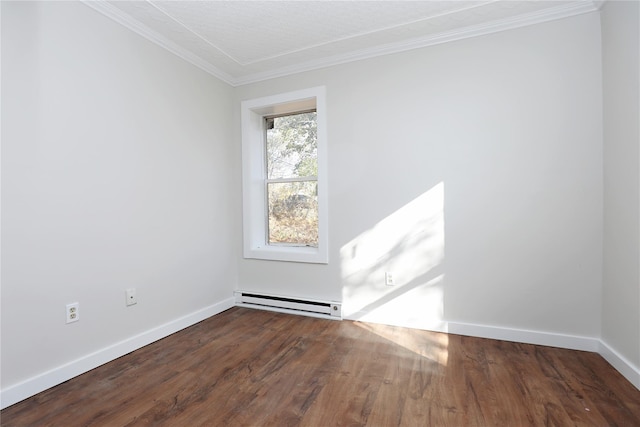 empty room with baseboard heating, crown molding, baseboards, and wood finished floors