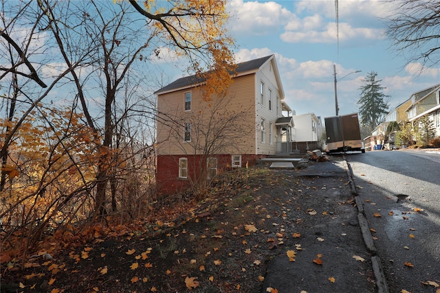 view of property exterior featuring a residential view