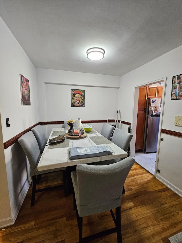 dining room featuring dark hardwood / wood-style floors