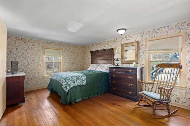 bedroom with hardwood / wood-style flooring