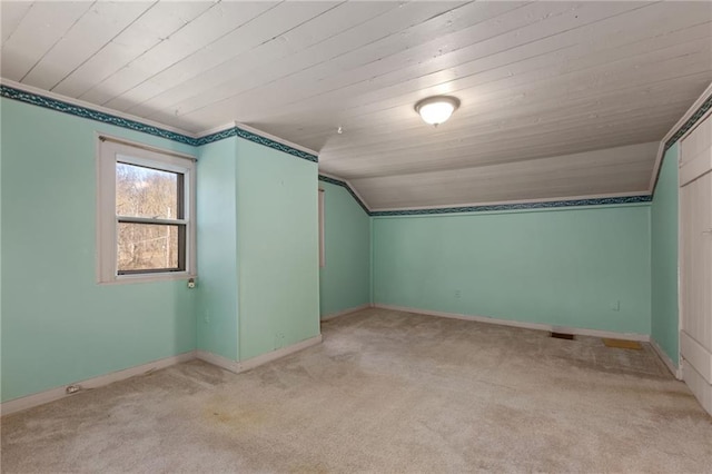 bonus room with light colored carpet, lofted ceiling, and wooden ceiling