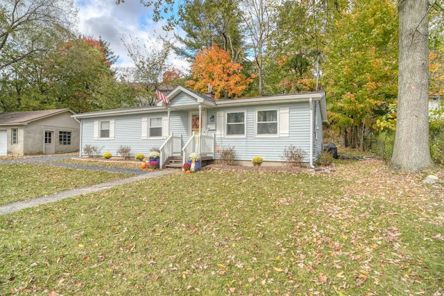 ranch-style home with a front yard