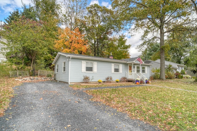 view of front of home with a front yard