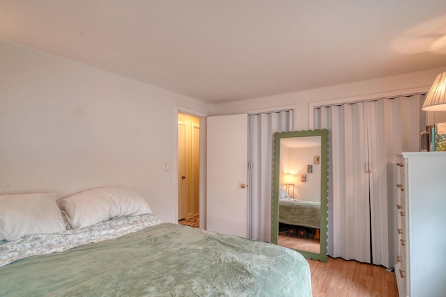 bedroom featuring light wood-type flooring