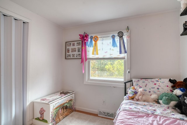 bedroom featuring light hardwood / wood-style flooring