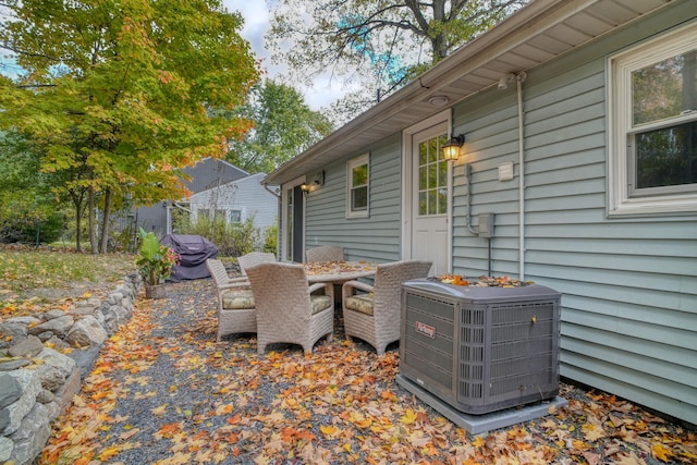 view of patio with central air condition unit and grilling area