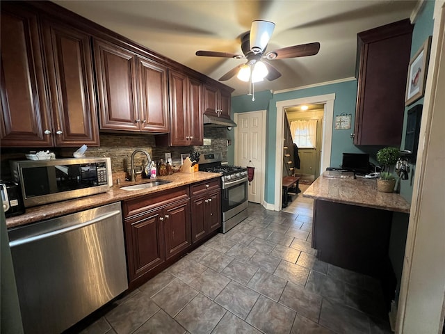 kitchen with ceiling fan, sink, tasteful backsplash, appliances with stainless steel finishes, and ornamental molding