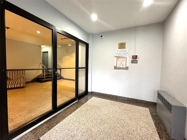 doorway featuring radiator