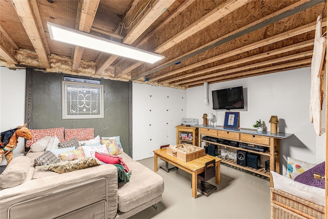 living room featuring concrete flooring