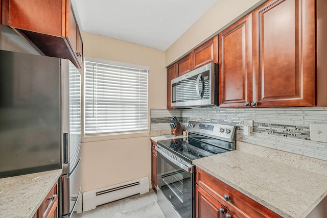 kitchen with light stone counters, stainless steel appliances, tasteful backsplash, and a baseboard heating unit